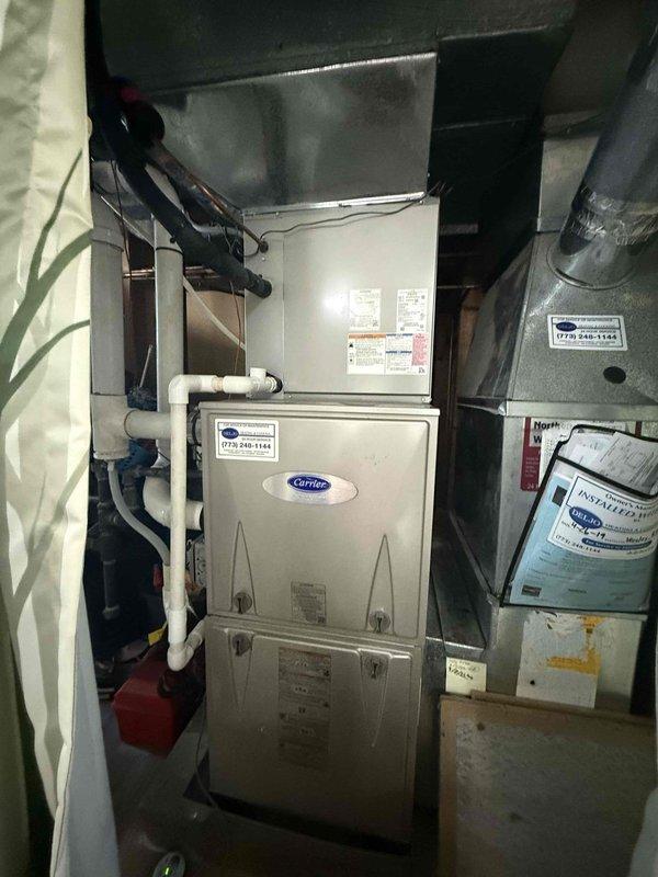 Completed preventive maintenance agreement service on residential HVAC system including Carrier furnace/air handler and outdoor condensing unit. Performed comprehensive inspection of electrical components in outdoor unit control panel, verifying proper operation of capacitor and contactor assembly with all color-coded wiring connections secure. Replaced 16x20x1 air filter at indoor air handler, inspected condensate drainage system, and documented equipment condition with photos for maintenance records.