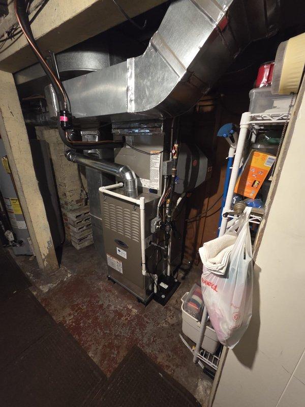 Completed full HVAC system replacement in residential basement mechanical room, including installation of new furnace unit with proper ductwork connections and plenum integration. Installed condensate pump, fan-powered humidifier, surge protector, and Ecobee thermostat to provide complete climate control functionality. All equipment properly mounted, vented with PVC piping, and connected to existing ductwork system with metal transitions, ensuring efficient airflow and system operation.