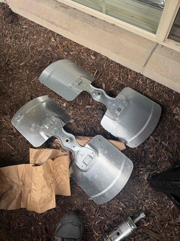 Returned to complete repair by replacing failed dual-run capacitor (45/5 MFD, 370/440 VAC) and installing new condenser fan wheel assembly. Removed old damaged fan blades and mounted replacement blade assembly to restore proper airflow and system operation.