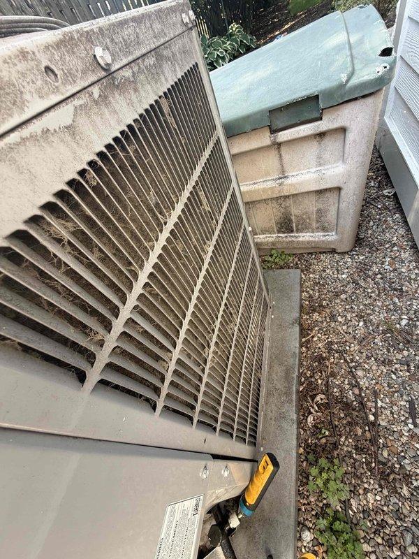 Completed HVAC maintenance agreement inspection on residential air conditioning system. Performed routine inspection of outdoor condenser unit, checked refrigerant lines, and documented equipment condition with photographs showing normal wear and outdoor weathering but no critical issues requiring immediate attention.