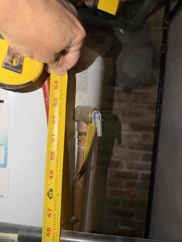 Responded to no cooling call and investigated reported leak from kitchen duct. Upon inspection, found moisture issue in mechanical room affecting ductwork, with drywall already opened by previous plumber. Documented existing plumbing and HVAC infrastructure, including water heater, copper piping with brass fittings, and horizontal duct runs. Measured duct components and assessed system layout to determine source of leak and provide estimate for circulating pump replacement as requested by customer.