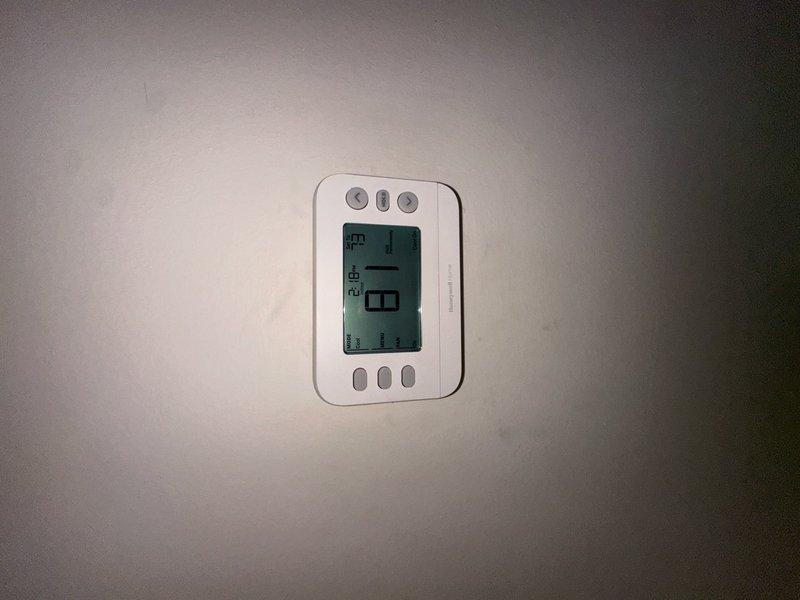 Responded to no cooling call on recent installation. Upon arrival, found thermostat powered on but system not operating. Diagnosed issue as improper wiring connection at thermostat causing communication failure between thermostat and outdoor unit. Corrected wiring terminations per manufacturer specifications, verified proper voltage at all connection points, and tested system operation through complete cooling cycle. Unit now cooling properly with all functions operating as designed.