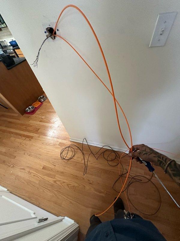 Responded to no cooling call on recent installation. Upon arrival, found thermostat powered on but system not operating. Diagnosed issue as improper wiring connection at thermostat causing communication failure between thermostat and outdoor unit. Corrected wiring terminations per manufacturer specifications, verified proper voltage at all connection points, and tested system operation through complete cooling cycle. Unit now cooling properly with all functions operating as designed.