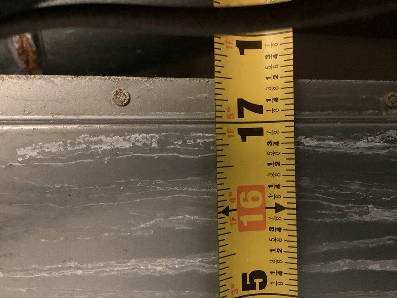 Responded to callback for intermittent indoor fan operation. Performed diagnostic evaluation of blower motor and control board assembly, taking measurements and documentation of clearances and component positioning within the air handler. Verified system operation and documented findings with photographic evidence of the mechanical components and piping configuration for service records.