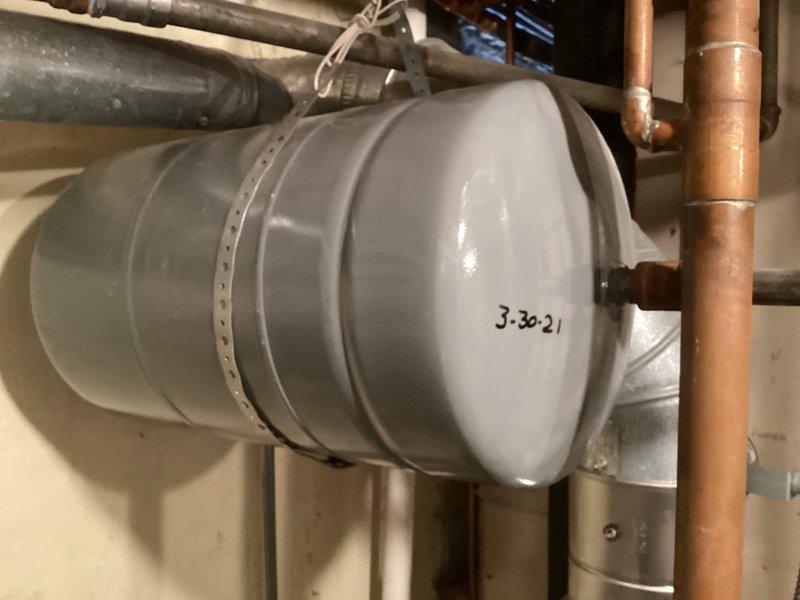 Performed routine maintenance on water boiler system including inspection of six-zone copper manifold with ball valves and gate valves, all zones properly tagged and operational. Inspected expansion tank and associated plumbing connections, verified all components functioning within normal parameters with no leaks or deficiencies noted.