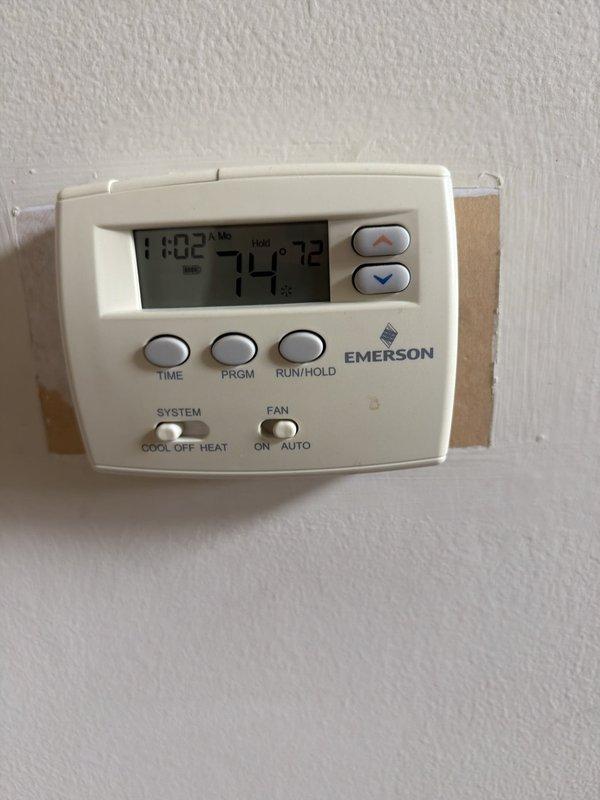 Successfully completed installation of new rear system air conditioning equipment. Replaced condenser unit positioned closest to garage and installed new evaporator coil on existing basement furnace. Verified thermostat programming and system operation upon completion.