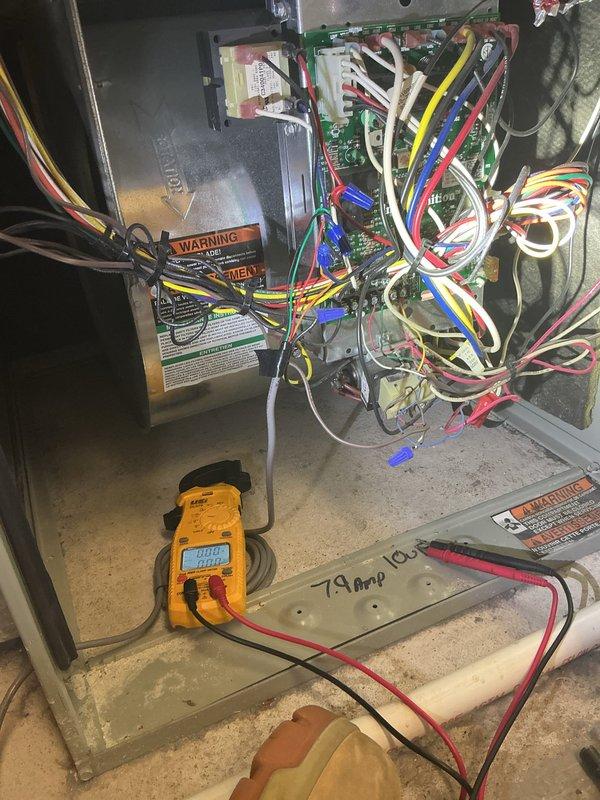 Completed comprehensive HVAC maintenance agreement service including air conditioning system inspection and diagnostics. Performed electrical testing of control panel components with multimeter, recording 79 amp reading, and inspected all wiring connections, circuit boards, and mechanical components. Replaced 16x25x1 air filter and documented system condition with photos of control panel, ductwork, PVC condensate drain line, and refrigerant line installation.