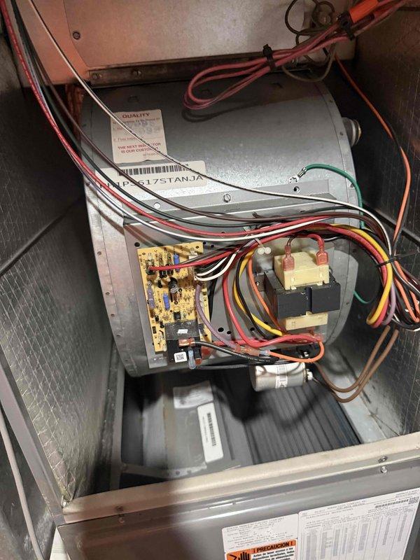 Responded to no cooling call on air conditioning system less than 10 years old. Upon inspection, discovered blown fuse in low voltage control circuit. Replaced defective fuse with proper replacement, restored power to system, and verified unit returned to normal cooling operation.