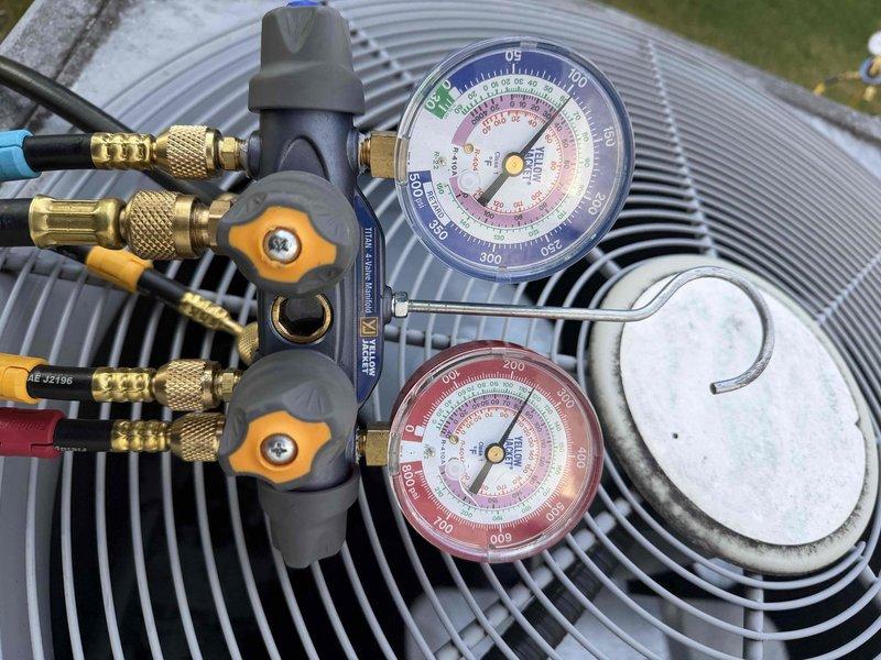 Performed routine maintenance on residential air conditioning system under preventative maintenance agreement. Connected manifold gauge set to measure system pressures and verify proper refrigerant charge levels. Inspected outdoor condenser unit including fan operation, coil condition, and electrical connections to ensure optimal system performance.