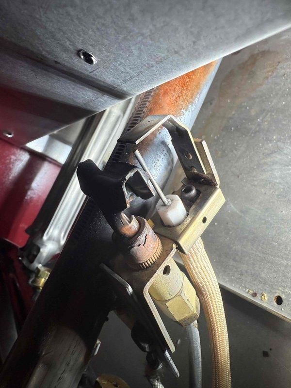 Completed annual maintenance tune-up on 5-year-old boiler system. Performed comprehensive inspection of heating equipment, ductwork connections, and associated components. All systems inspected and found operational, with documentation photos taken of ductwork installation and mechanical connections showing normal wear consistent with unit age.