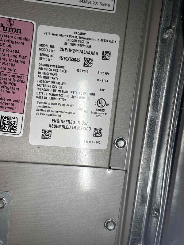 Completed routine maintenance agreement service on Puron R-410A cooling system, model CNPHP2417ALAAAAA. Accessed crawlspace filter location using 12-foot ladder to replace 16x25x1 filter. Inspected electrical components including capacitor, contactor, and associated wiring connections, confirming all components operating within normal parameters. Documented unit specifications and current operating condition with photographs for service records.