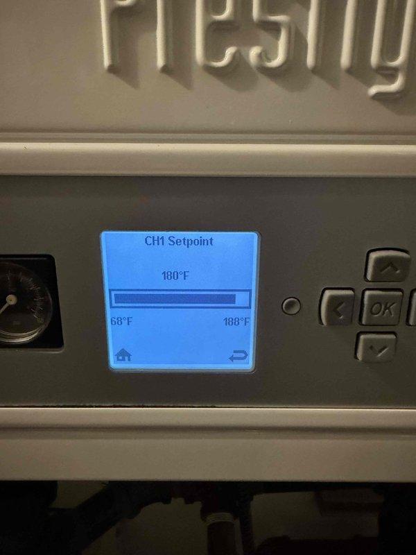 Responded to callback for boiler system that received repairs on Friday. Upon arrival, verified system operation and confirmed CH1 setpoint properly configured at 188°F with system maintaining target temperature. Reviewed control interface functionality and documented proper operation of Prestige controller with all parameters displaying correctly.