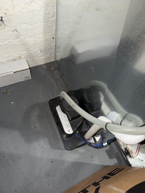 Performed preventive maintenance on dual condenser system with multi-zone configuration. Inspected third-floor thermostat controlling second and third floor cooling zones, verified proper operation and temperature settings. Examined condensate drain system and pump installation in basement, confirmed proper drainage function and secure connections of discharge lines and electrical components.