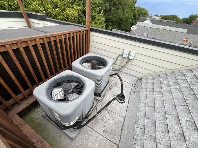 Provided estimate for HVAC system replacement on 11-year-old dual air conditioning unit installation located on rooftop with easy access. Evaluated existing two-condenser setup with indoor furnace equipment and discussed replacement options versus costly repair alternatives for aging system.