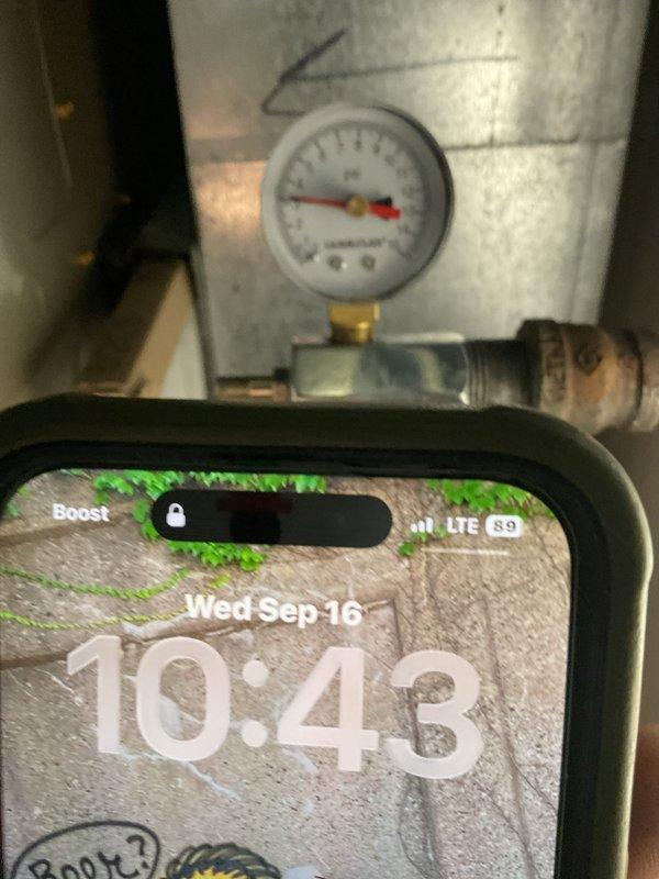 Performed gas leak pressure test on HVAC system. Installed pressure gauge on gas line to monitor system integrity and verify no leaks present in the Carrier furnace installation. Testing confirmed proper pressure readings and system safety, with all connections and valves functioning as specified.