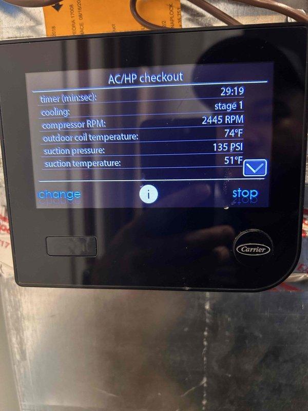Responded to service call for Carrier HVAC system intermittently shutting off during operation and failing to maintain setpoint temperature. Performed diagnostic checkout on air conditioning heat pump system, monitoring compressor operation at 2445 RPM in cooling stage 1, outdoor coil temperature at 74°F, suction pressure at 135 PSI, and suction temperature at 51°F. Inspected control board and wiring connections, documenting system parameters and electrical components for further troubleshooting of intermittent shutdown issue.
