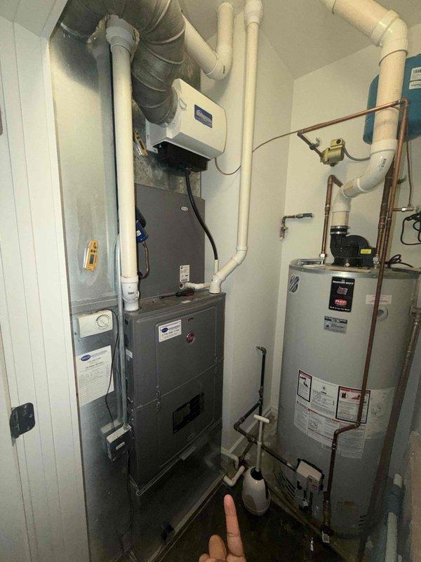Completed cooling check on two condenser units as part of preventative maintenance agreement. Inspected indoor mechanical equipment including furnace, water heater connections, and associated PVC and copper piping systems. Verified proper operation of all HVAC components, checked refrigerant lines, electrical connections, and condensate drainage. All systems operating within normal parameters with no immediate service needs identified.