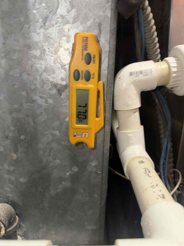 Completed comprehensive maintenance on furnace and humidifier system under service agreement. Replaced humidifier pad and installed #10 and 16x25x1 filter, performed system inspection with temperature readings confirming proper operation at 77.3°F, and documented equipment condition with photos showing ductwork, plumbing connections, and HVAC components in good working order.