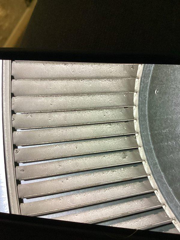 Completed comprehensive HVAC maintenance agreement service on furnace and humidifier system. Performed thorough inspection of internal components, removed and examined air filtration system showing normal wear, verified electrical connections and wiring integrity throughout unit, and documented condition of ductwork and ventilation components including curved transition vent showing dust accumulation consistent with regular operation.