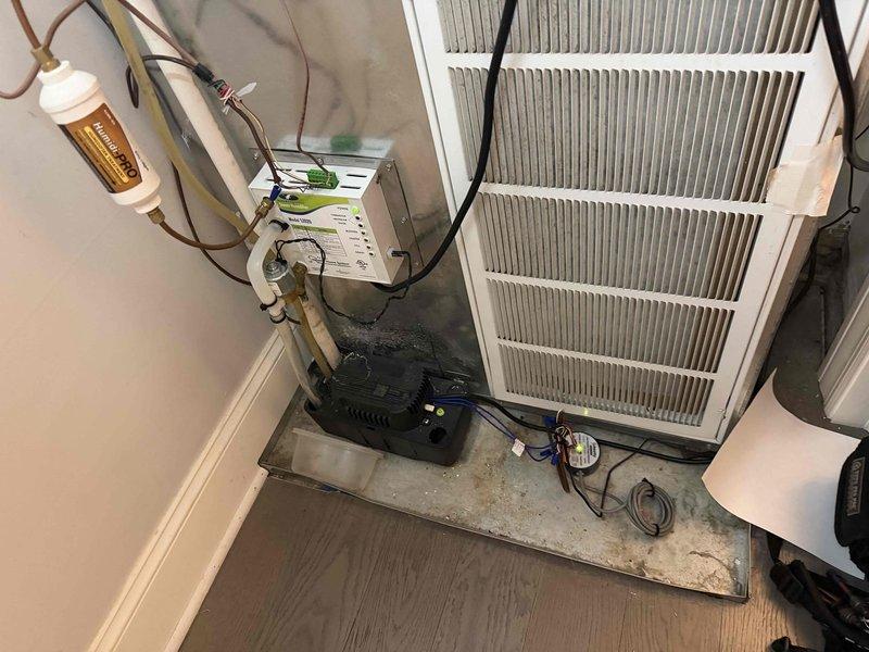 Performed maintenance on Unico COTW system including acid cleaning of Humidi-PRO steam humidifier and replacement of air handler filter. All equipment inspected and verified operational, with humidifier properly reconnected to system and functioning correctly upon completion.