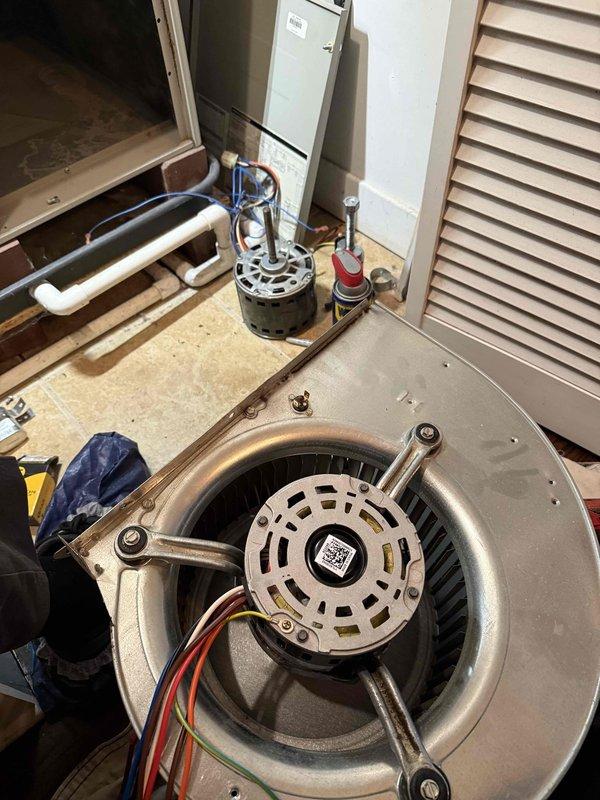Returned to property to complete blower motor replacement on air handler unit. Successfully removed failed blower motor assembly from cabinet, installed new motor with proper electrical connections, and verified operational functionality of the HVAC system upon completion.
