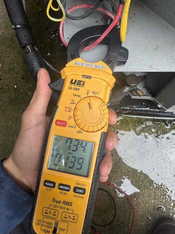 Performed preventative maintenance on condenser unit per agreement terms. Utilized digital clamp meter to measure electrical parameters including voltage readings of 734V and 1139V at disconnect, followed by amperage readings of 6.45A and 0.060A on system wiring. Inspected outdoor condenser unit, verified proper electrical connections, and confirmed system operating within normal parameters. All measurements recorded for service documentation.