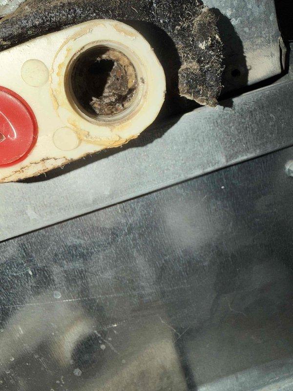 # HVAC Service Completed

Responded to no cooling call on system less than 10 years old. Upon arrival, found half inch of standing water accumulated under furnace unit in basement. Ecobee thermostat and system had shut down due to safety sensor activation, with sensor displaying both red and green indicator lights.

Investigated condensate drain system and identified blockage causing water backup. Cleared primary drain line obstruction and verified proper drainage flow. Tested condensate safety switch operation and confirmed proper functioning. Restored power to system and verified thermostat communication re-established.

Proceeded to rooftop to inspect two condenser units. Connected Yellow Jacket Titan 4-valve manifold gauges to measure refrigerant pressures and system performance. Evaluated refrigerant charge levels and operating pressures on both condensers. Checked compressor operation, fan motor function, and electrical connections at outdoor units.

Inspected 16x25x1 filter at f