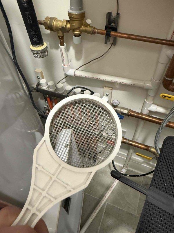 Completed comprehensive maintenance agreement service on single furnace, tankless water heater, and energy recovery ventilator system. Performed system diagnostics including temperature differential measurements across heat exchanger components, verified proper combustion and ventilation operations, and conducted routine filter maintenance with 16x25x1 filter replacement. Cleaned tankless water heater inlet screen strainer to ensure optimal water flow and prevent sediment buildup that could affect unit performance.