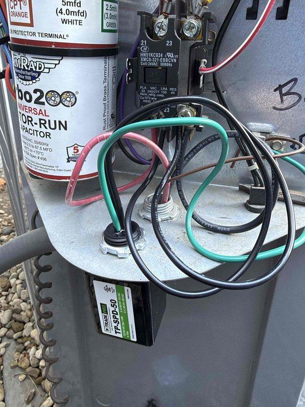 Installed two surge protectors on the HVAC system to safeguard electrical components including the capacitor, contactor, and control circuits from voltage spikes and power surges. All electrical connections were properly secured and the system was tested to verify proper operation and protection.