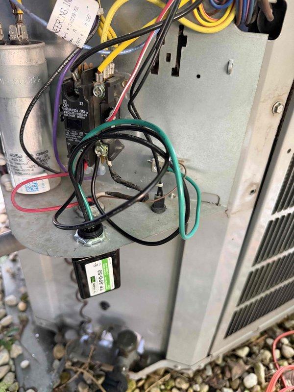 Installed two surge protectors on the HVAC system to safeguard electrical components including the capacitor, contactor, and control circuits from voltage spikes and power surges. All electrical connections were properly secured and the system was tested to verify proper operation and protection.