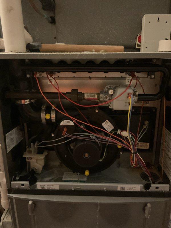 Completed preventive maintenance agreement inspection on 15-year-old gas furnace serving downstairs condo unit in duplex. Performed comprehensive system evaluation including pressure switch testing using digital manometer, which confirmed proper differential pressure readings within manufacturer specifications. Inspected blower assembly, motor components, electrical connections, and wiring harness for signs of wear or deterioration. All internal components found to be in satisfactory operating condition with no immediate service needs identified. Unit operating properly at time of inspection.