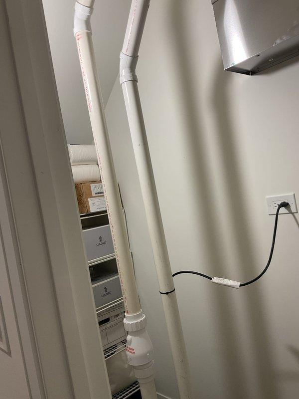 Completed return visit for PVC drain line repair in utility room. Repaired and secured vertical PVC drainage piping with proper fittings and joints, ensuring proper alignment and connection integrity throughout the system.