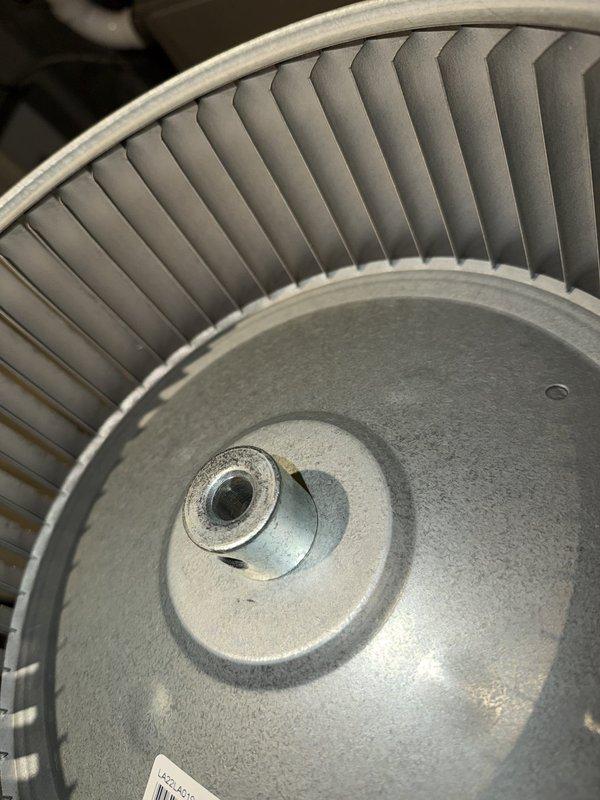 Completed HVAC system cleaning that was previously initiated, with specific attention to mold remediation near the rooftop unit. Removed and thoroughly cleaned blower wheel assembly, which showed significant dust accumulation and discoloration on the curved blades and central hub. Addressed mold contamination in the RTU area to restore proper air quality and system performance.