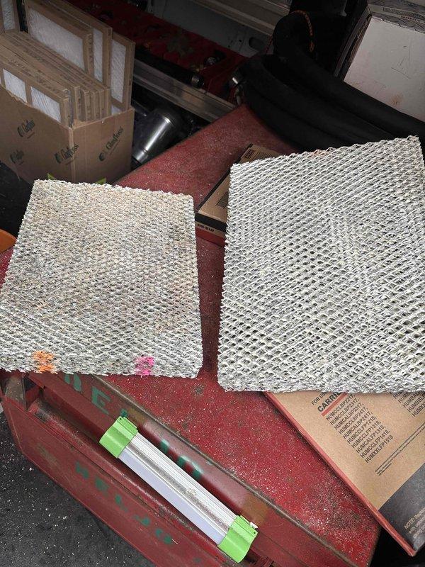 Completed scheduled HVAC maintenance agreement service on furnace system. Performed comprehensive inspection of blower motor assembly and replaced air filters. Documented equipment condition with photos of blower wheel assembly and filter replacement for maintenance records.