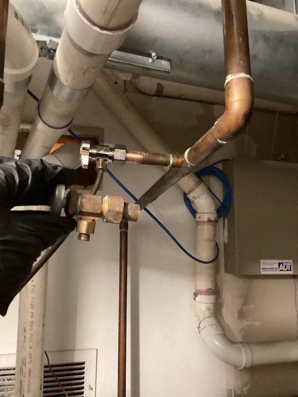 Returned to complete previously scheduled repairs on residential HVAC system. Replaced faulty flame sensor and ignitor to restore proper burner operation and system safety. Installed new angle shut-off valve on water supply line to improve system serviceability and code compliance. Completed two additional minor repairs identified during initial service visit. Performed complete system drain and refill procedure to remove sediment and contaminants, ensuring optimal heat transfer efficiency and extending equipment lifespan. All replaced components tested and verified operational. System restored to full functionality with improved reliability and safety.