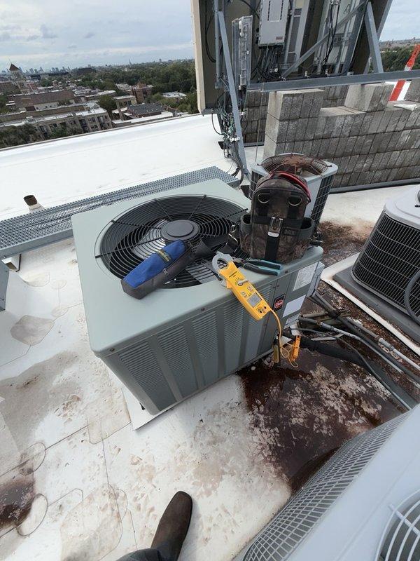 # HVAC Service Report

Responded to no cooling complaint on rooftop AC unit. Performed diagnostic testing on condenser unit using digital multimeter to check electrical components and system performance. Unit showed signs of age-related wear consistent with 10+ years of operation. Inspected interior components including insulation and structural elements for potential airflow restrictions or system degradation. Documented equipment condition with photographs for service records. System evaluated and findings reviewed with property representative.