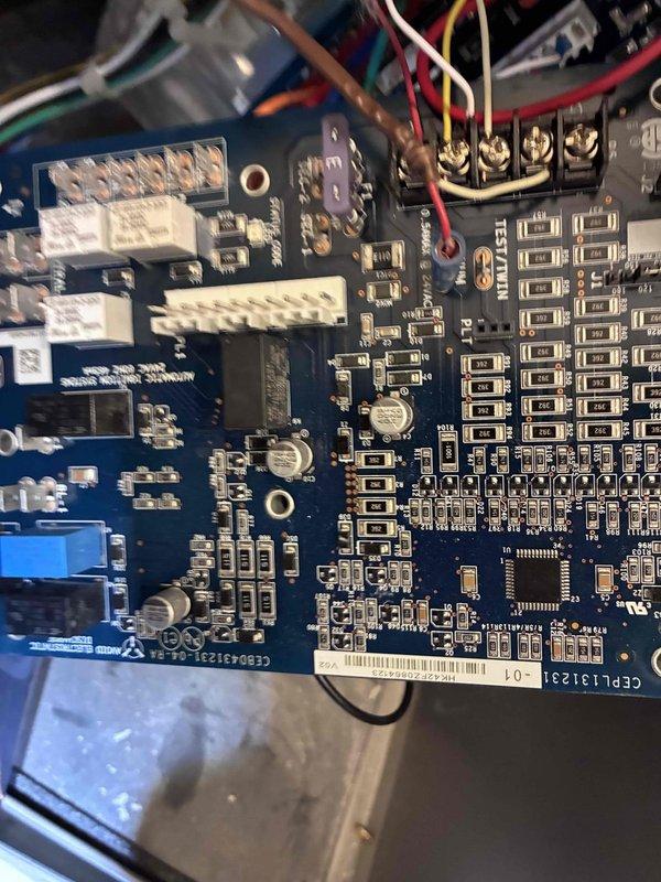 Returned to complete circuit board replacement on HVAC control system. Removed failed control board and installed new replacement PCB with integrated circuits, connectors, and 24V motor tap connections. Verified all wire terminations to terminal blocks, confirmed proper seating of multi-pin connectors, and tested system operation upon completion.