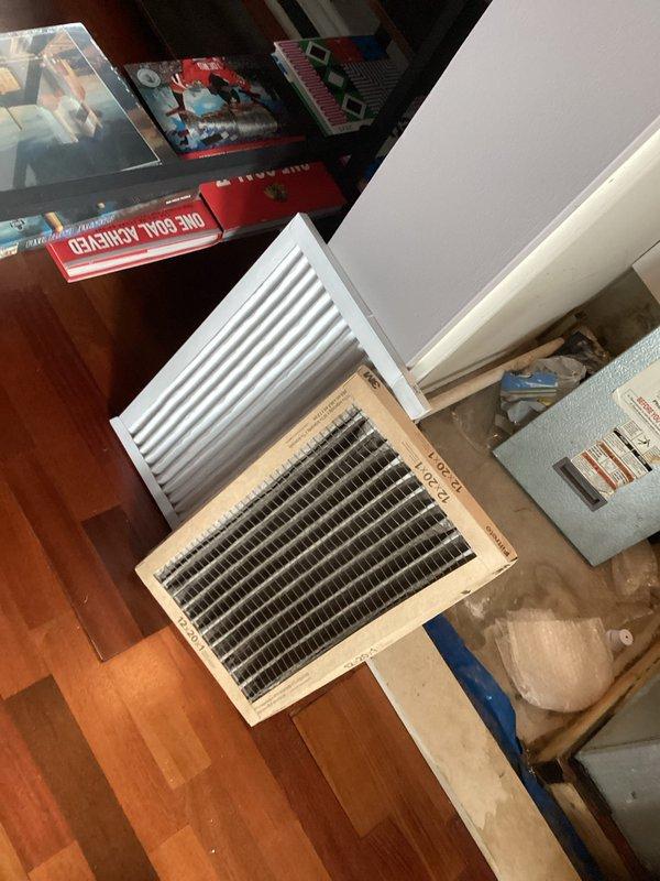 Completed comprehensive heating system tune-up and maintenance inspection at residential condo unit. Verified thermostat operation and calibration with unit heating to setpoint of 71 degrees, inspected floor register and return air grille, and performed standard preventive maintenance procedures on HVAC equipment including filter assessment and system controls verification.