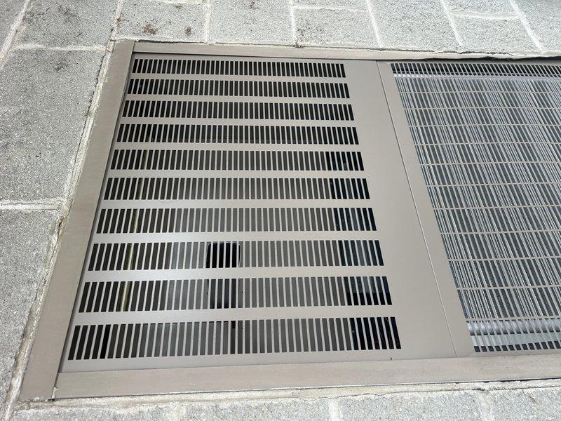 Responded to callback for HVAC installation experiencing continuous operation and water leakage. Inspected outdoor condensing unit and ventilation components, documented current condition with photos showing properly mounted equipment and grilles in functional condition. Addressed operational issues to restore system to normal cycling and eliminate water discharge problem.