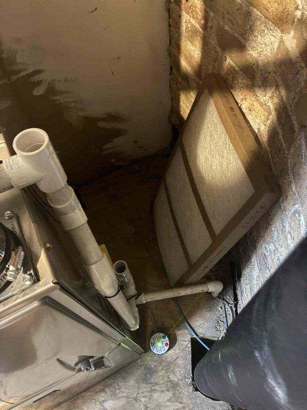 Completed full HVAC system replacement including furnace, condenser unit, and evaporator coil. Installation performed in mechanical room with new air handler, PVC condensate drainage lines, and proper ductwork connections. System commissioning included refrigerant charge verification with manifold gauges showing proper operating pressures at 21.7 PSI, vacuum testing for leak-free operation, and confirmation of all mechanical components functioning within manufacturer specifications.