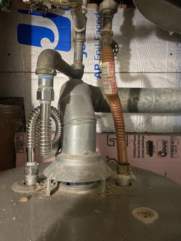 Completed comprehensive maintenance agreement service on HVAC system including furnace, whole-house humidifier, and water heater. Replaced humidifier evaporator pad with new 14x20x1 General Service filter, removing old saturated pad that showed significant mineral buildup and discoloration. Inspected humidifier assembly, water supply line connections, and drainage components for proper operation and verified all electrical connections and controls were functioning correctly.