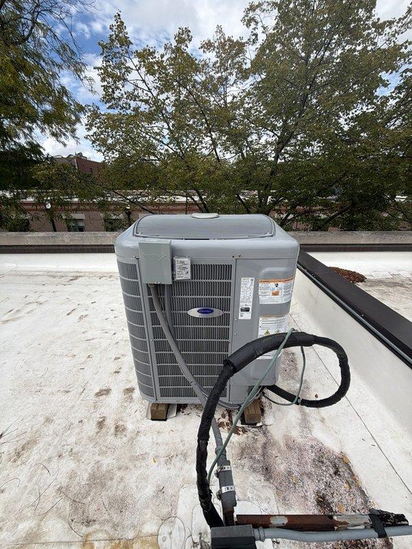 Completed preventive maintenance agreement service on rooftop-mounted Carrier condenser unit, furnace, and humidifier system. Accessed equipment via 40-foot ladder to reach rooftop installation. Performed comprehensive inspection of condenser unit including refrigerant line connections, electrical components, and operational testing. Unit found in satisfactory working condition with all components functioning within normal parameters.