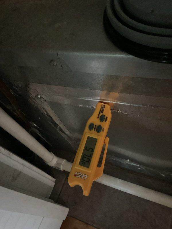 Completed routine HVAC maintenance agreement service on residential cooling system. Performed comprehensive inspection of condenser unit and furnace assembly, verifying proper operation of all components. Measured and documented system temperatures using digital instrumentation, recording 51.8°F reading at condenser unit. Inspected condensate drain lines for proper flow and verified PVC drainage piping integrity. Accessed furnace cabinet to examine internal electrical components, control boards, wiring connections, and transformer assembly. Confirmed all electrical connections were secure and control boards showed no signs of damage or malfunction. Replaced 16x20x1 air filter to maintain proper airflow and system efficiency. All equipment operating within normal parameters at time of service completion.