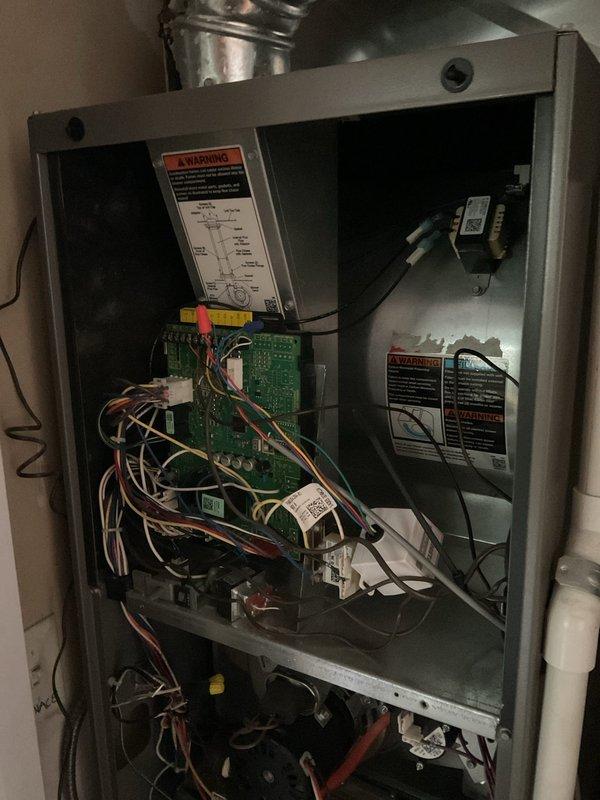 Completed routine HVAC maintenance agreement service on residential cooling system. Performed comprehensive inspection of condenser unit and furnace assembly, verifying proper operation of all components. Measured and documented system temperatures using digital instrumentation, recording 51.8°F reading at condenser unit. Inspected condensate drain lines for proper flow and verified PVC drainage piping integrity. Accessed furnace cabinet to examine internal electrical components, control boards, wiring connections, and transformer assembly. Confirmed all electrical connections were secure and control boards showed no signs of damage or malfunction. Replaced 16x20x1 air filter to maintain proper airflow and system efficiency. All equipment operating within normal parameters at time of service completion.