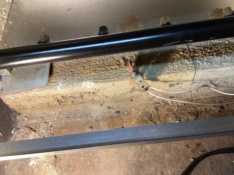 Completed annual maintenance agreement inspection on boiler system. Documented existing hydronic piping configuration including zone valves, pressure relief components, and copper supply lines showing normal patina development. Inspected burner assembly, noted aged insulation material on flue piping with visible deterioration, and verified all safety controls and limit switches operational.