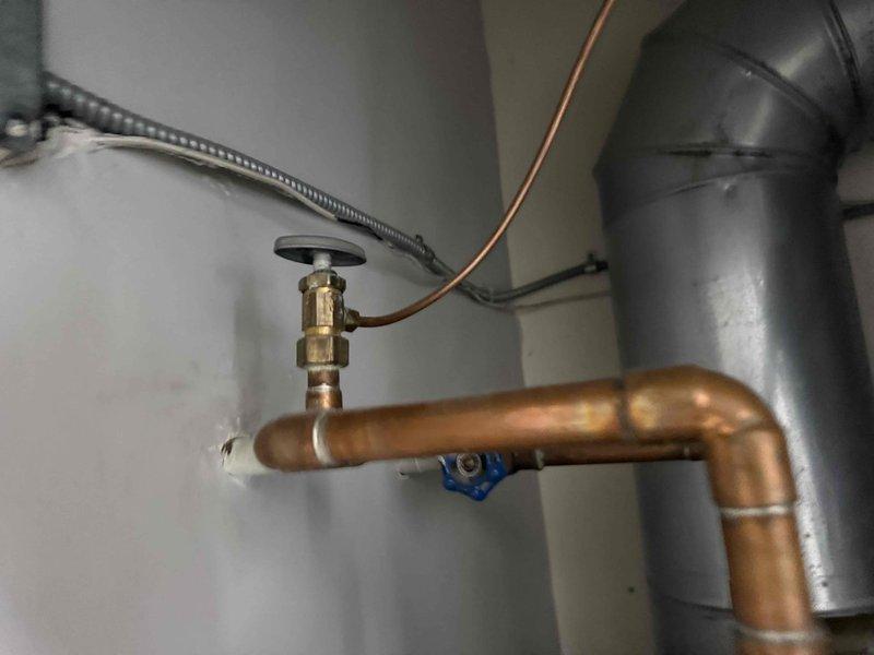 Responded to no-heat call on 16-year-old heating system with reported whistling noise and concerns about air leakage from coils. Performed comprehensive safety inspection of unit, including visual examination of heat exchanger, ductwork connections, and gas piping components. Measured supply air temperature at 83°F and inspected all accessible mechanical components, copper gas lines, and ventilation ductwork for proper operation. Verified system safe for operation with child present in home and confirmed unit heating effectively despite age of equipment.