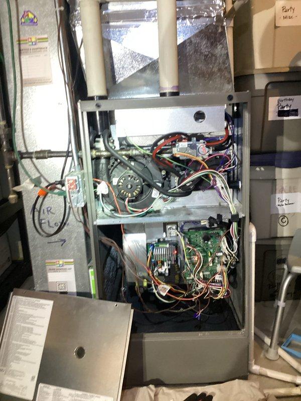 Returned to property to complete warranty installation of replacement driver board for lower level furnace. Successfully installed new control board assembly, reconnected all wiring harnesses including blower motor connections and system controls, verified proper board mounting and electrical connections, tested system operation to confirm furnace functionality, and closed access panel upon completion.