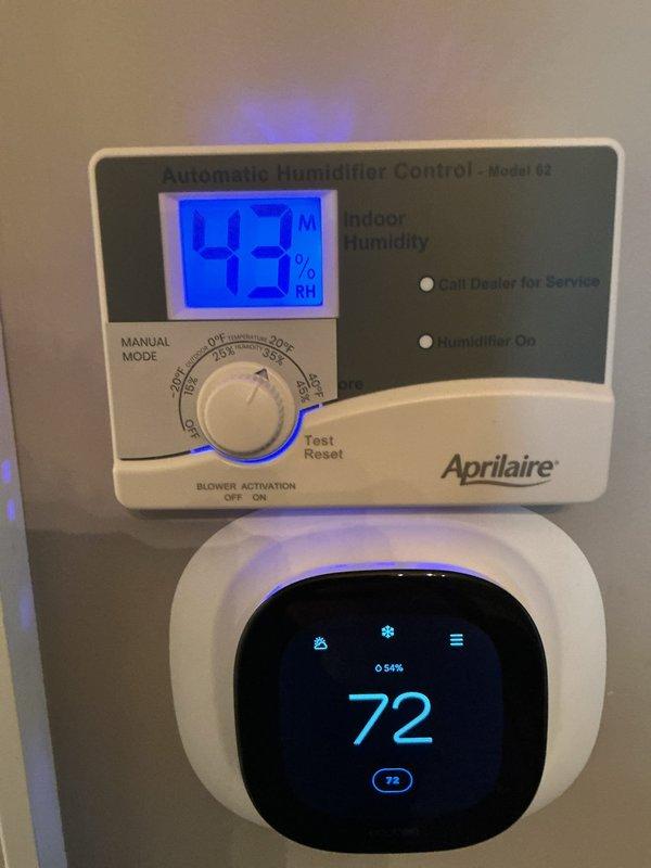 Performed HVAC maintenance agreement service call for humidification system. Replaced steam humidifier canister tank with GS #80 cannister on CC steam humidifier unit. Verified Aprilaire Model 62 Automatic Humidifier Control operation showing proper indoor humidity readings of 42-43% with green indicator light confirming humidifier activation. System operating correctly with thermostat displaying 72°F and coordinating with humidifier control for optimal climate management.