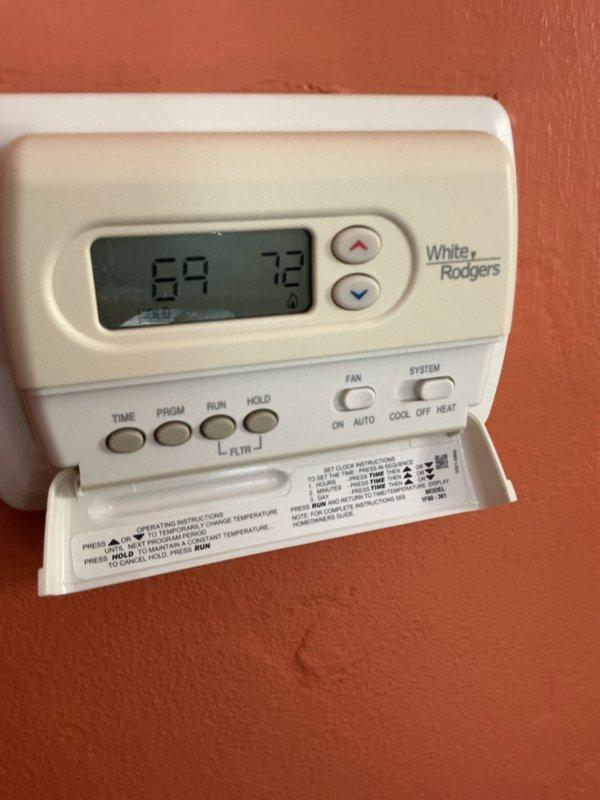 Completed comprehensive maintenance agreement service on GS steam boiler system. Inspected and documented boiler piping infrastructure, including brass valves, galvanized supply lines, and associated mechanical components in utility space. Verified thermostat operation and programming functionality, confirming proper temperature control settings and system communication with heating equipment.