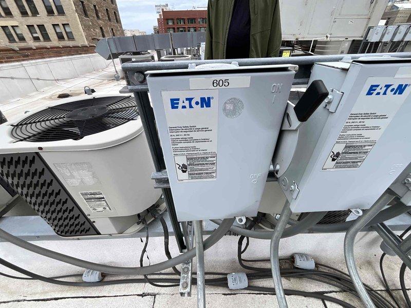 Conducted comprehensive site evaluation for complete HVAC system replacement. Assessed existing indoor air handler unit located in utility closet, documenting current equipment specifications, ductwork configuration including metallic supply plenum with flexible connections, and associated plumbing lines. Evaluated outdoor rooftop condensing unit with visible fan assembly and noted electrical infrastructure including Eaton disconnect boxes and conduit routing. Photographed all equipment, electrical connections, and installation conditions to provide detailed documentation for full system replacement proposal. Provided estimate for new HVAC system installation based on existing configuration and site requirements.